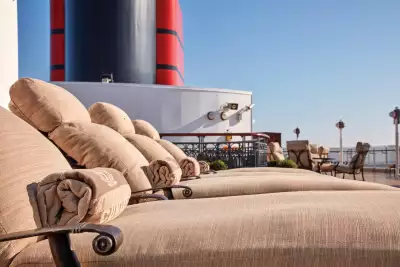Cunard Cruises | Sun loungers on the terrace on the Cunard Queen Elizabeth