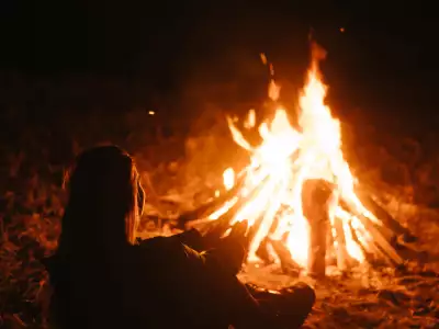 BTG Wellness Soulful Radiance Retreat | Someone sitting by a campfire