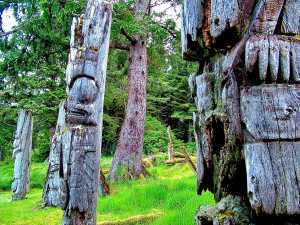 Canadian natural attractions | Totem poles in a forest in Haida Gwaii