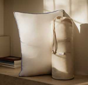 The Henrie Adjustable Pillow and its bag