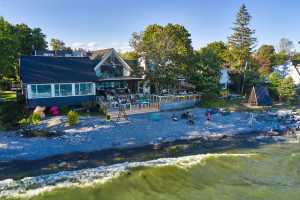 New Toronto hotels | A lakeside view of the Drake Devonshire Inn in Prince Edward County