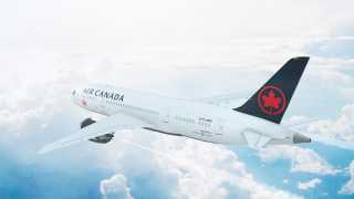 Aeroplan points partners with Starbucks Rewards | An Air Canada plane