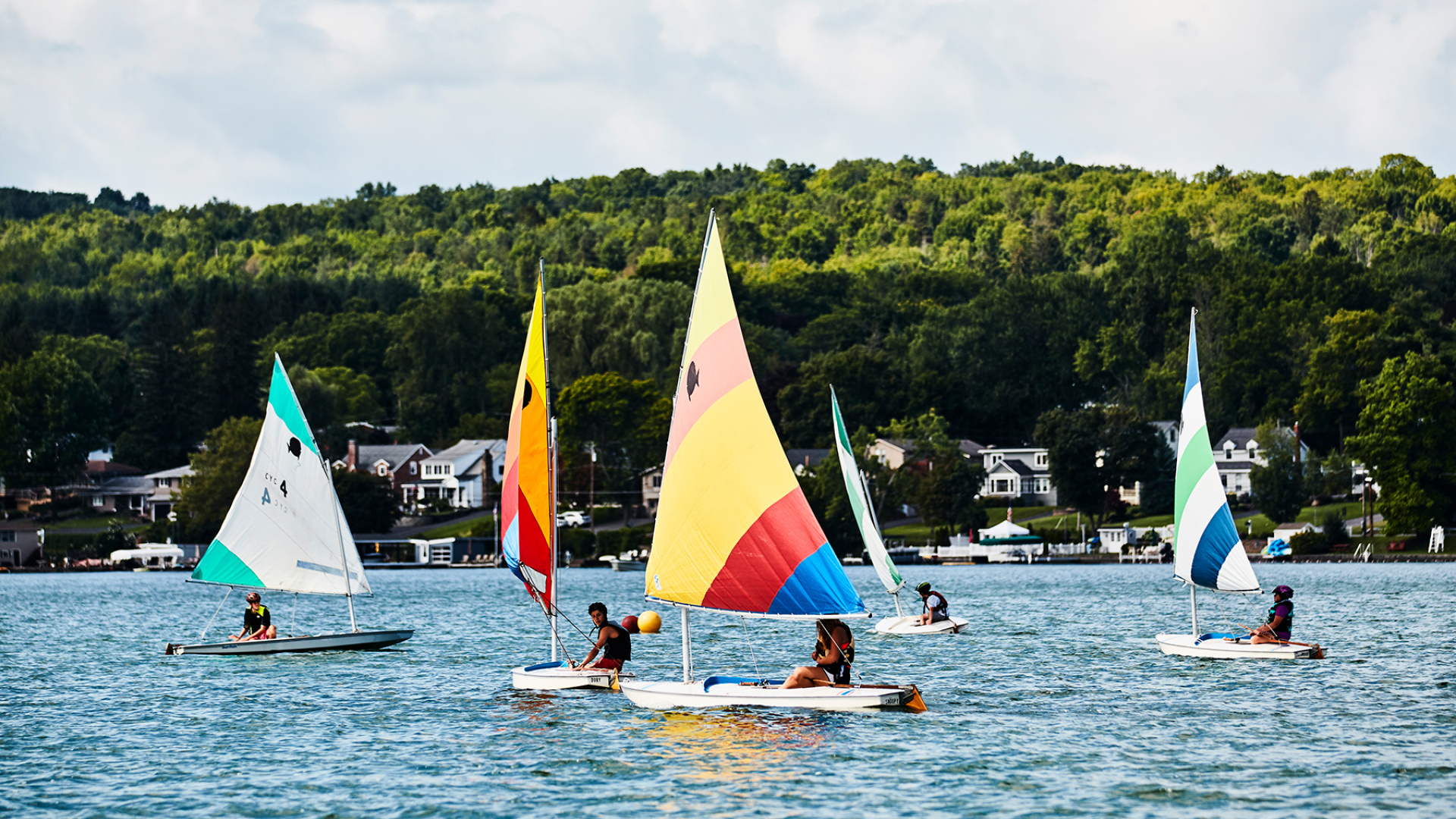 Finger Lakes, New York | Colourful boats sail on Canandaigua Lake