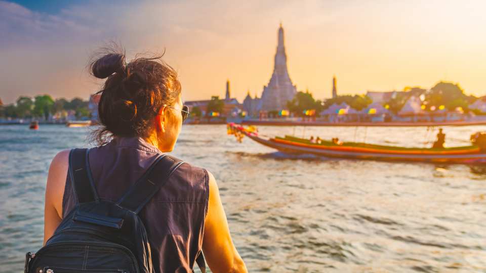 Travel tips | A woman travelling on a boat