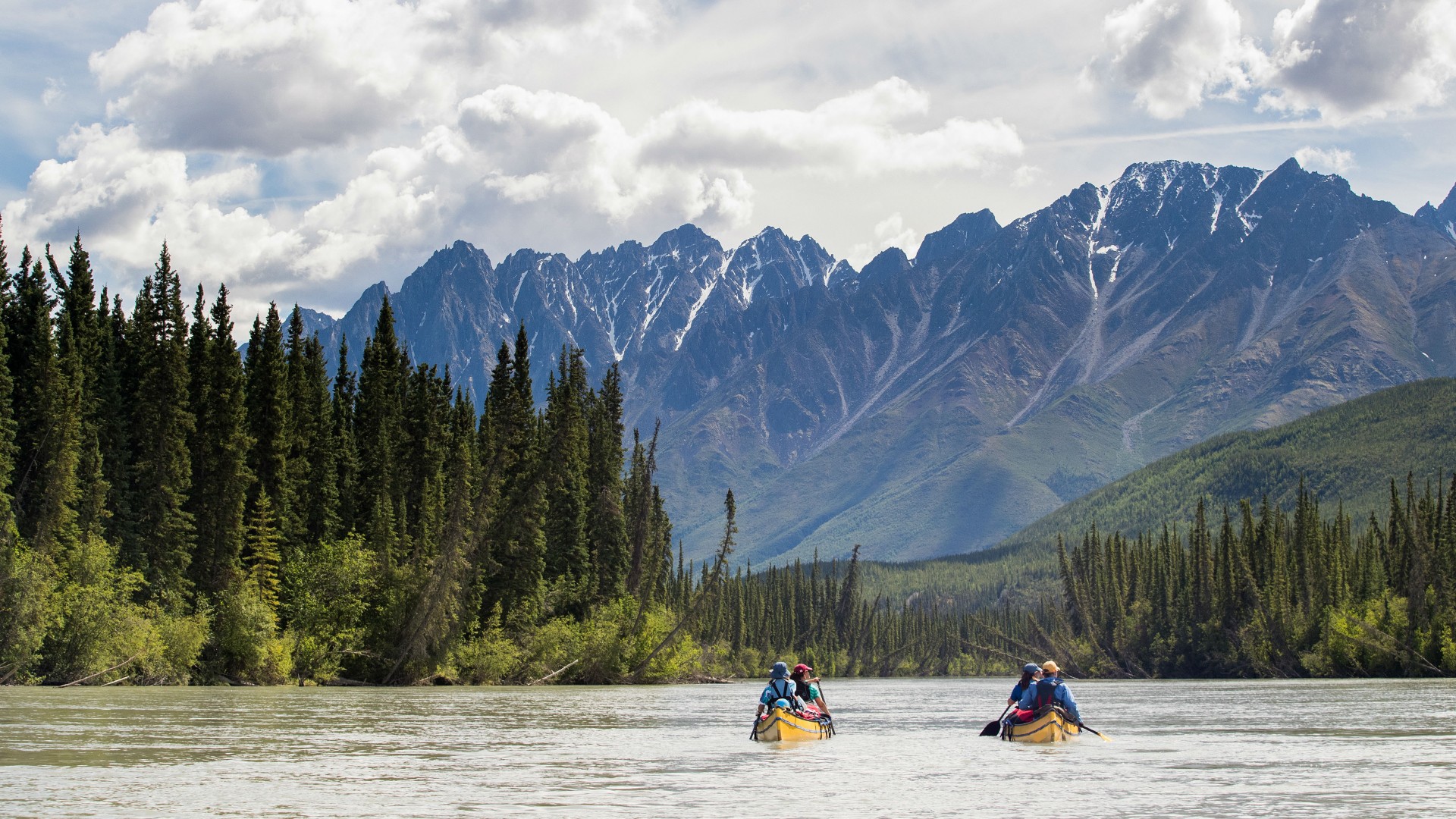 Canoe through canyons on the South Nahanni River Canoe through canyons on the South Nahanni River