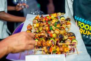 Barbados Rum and Food Festival | Grabbing skewers at the festival