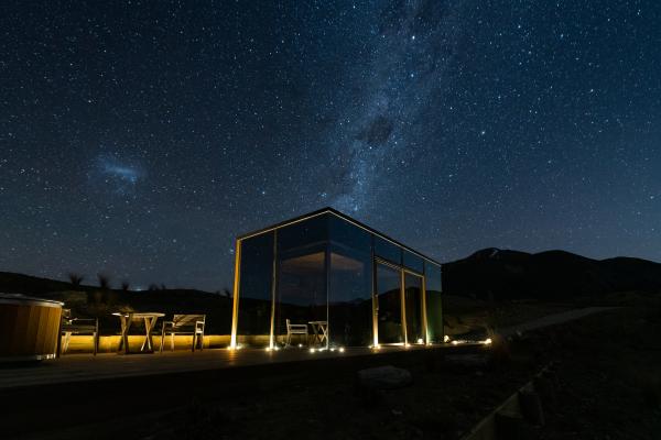 Best honeymoon destinations | A reflective pod at night at The Lindis, New Zealand