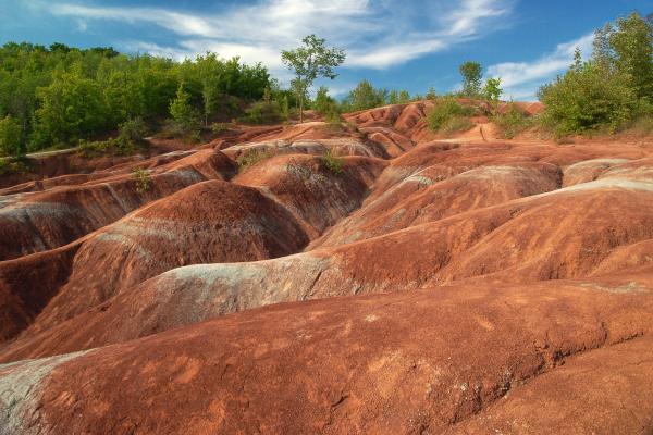 Canadian natural attractions | The rolling red Cheltenham Badlands in Ontario