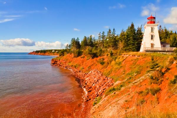 Canadian natural attractions | A lighthouse on P.E.I.'s red coast