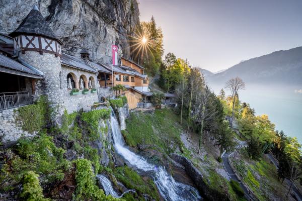 Interlaken, Switzerland | The exterior and waterfall at St. Beatus Caves in Switzerland