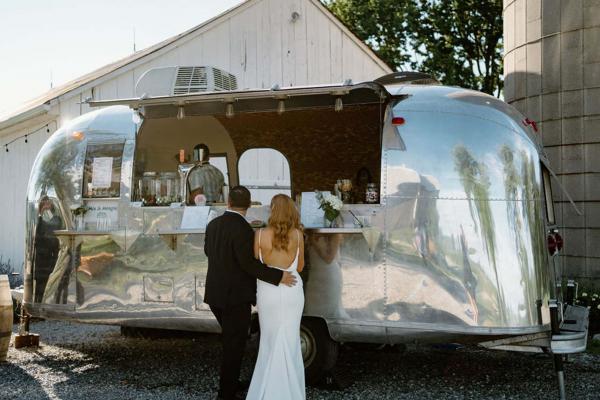 The Mobile Mixer | A couple order from the Airstream at their wedding