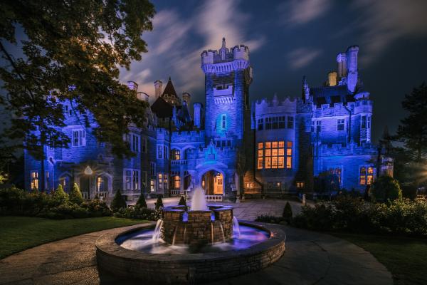 Casa Loma lit up with spooky lighting for Legends of Horror and Zombie Apocolypse