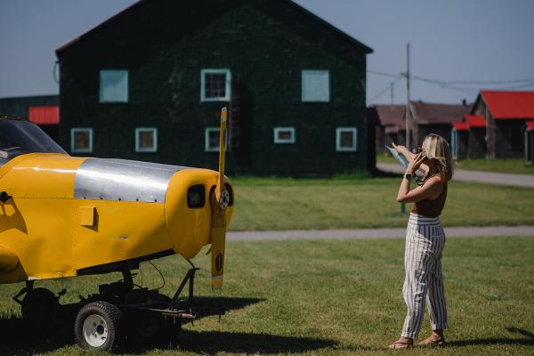 An airplane on the lawn at Base31 in Picton, Ontario