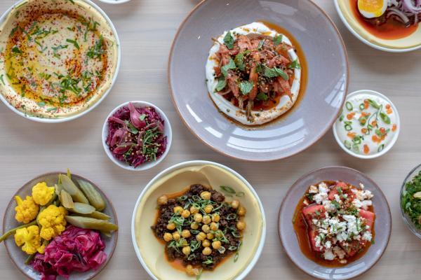Denver, Colorado restaurants | A spread of dishes at Safta