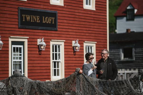 Trinity, Newfoundland | A couple outside Twine Loft