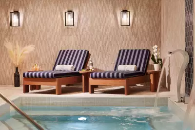 124 on Queen Hotel and Spa | Loungers by the pool at The Spa at Q