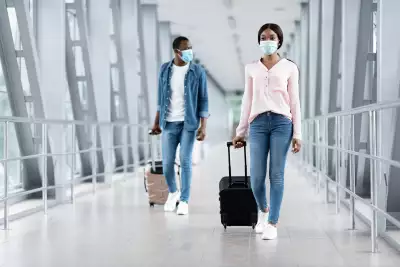 Travel tips | People walking through the airport with luggage