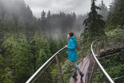 Travel tips | A woman walking on Capilano Suspension Bridge Park in North Vancouver