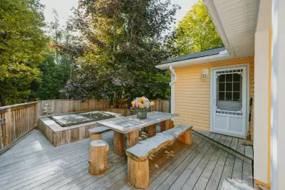 The back deck and hot tub at Wish Lakehouse, waterfront Ontario cottage rental