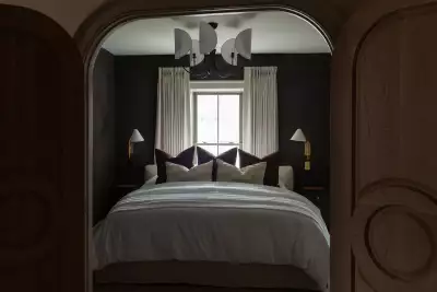 A guest bed at The Kat Florence hotel, Elora