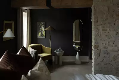 Seating area in a guest room at The Kat Florence Hotel