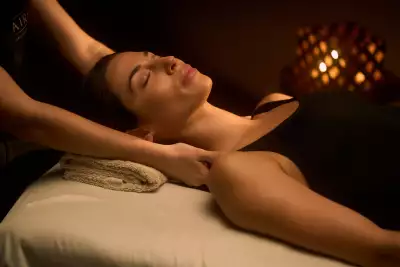 A guest receiving a shoulder massage at Aire Ancient Baths Toronto