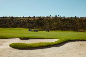 Golf carts drive along the course at Fairmont Grand Del Mar, San Diego