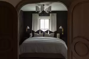 A guest bed at The Kat Florence hotel, Elora