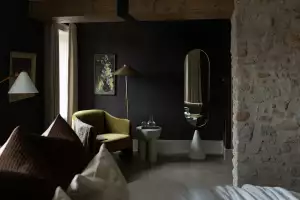 Seating area in a guest room at The Kat Florence Hotel