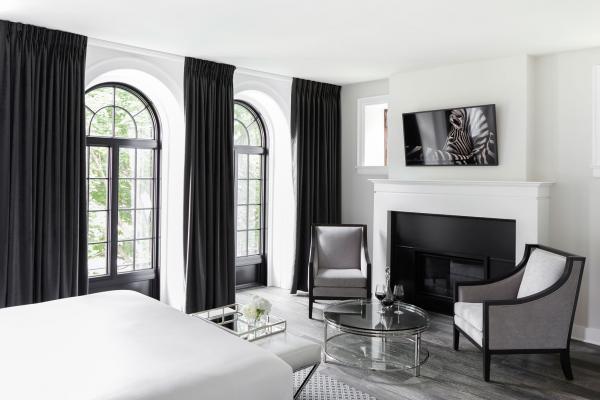 Things to do in Toronto and the GTA | A guest room with a fireplace at the Frontenac Club Hotel in Kingston