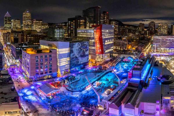Montréal vegan restaurants | Downtown Montréal lit up with vibrant colours