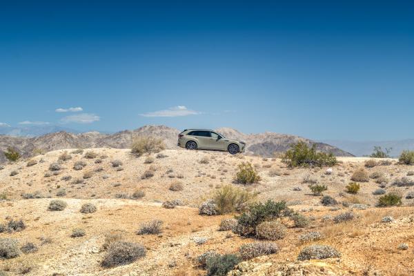 A Mazda CX-70 driving in the desert in Palm Springs, California