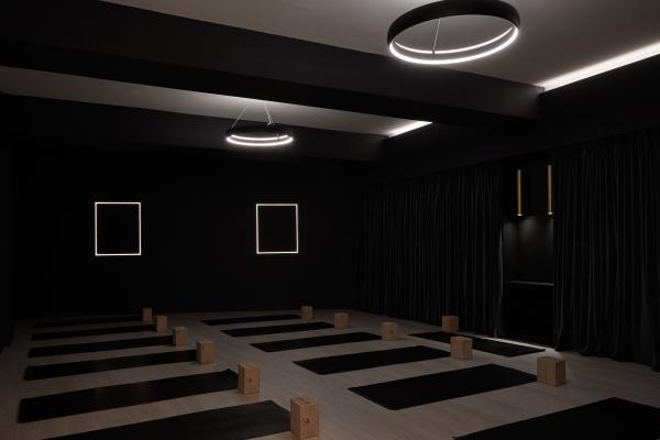 A blacked-out yoga studio at Chi Junky
