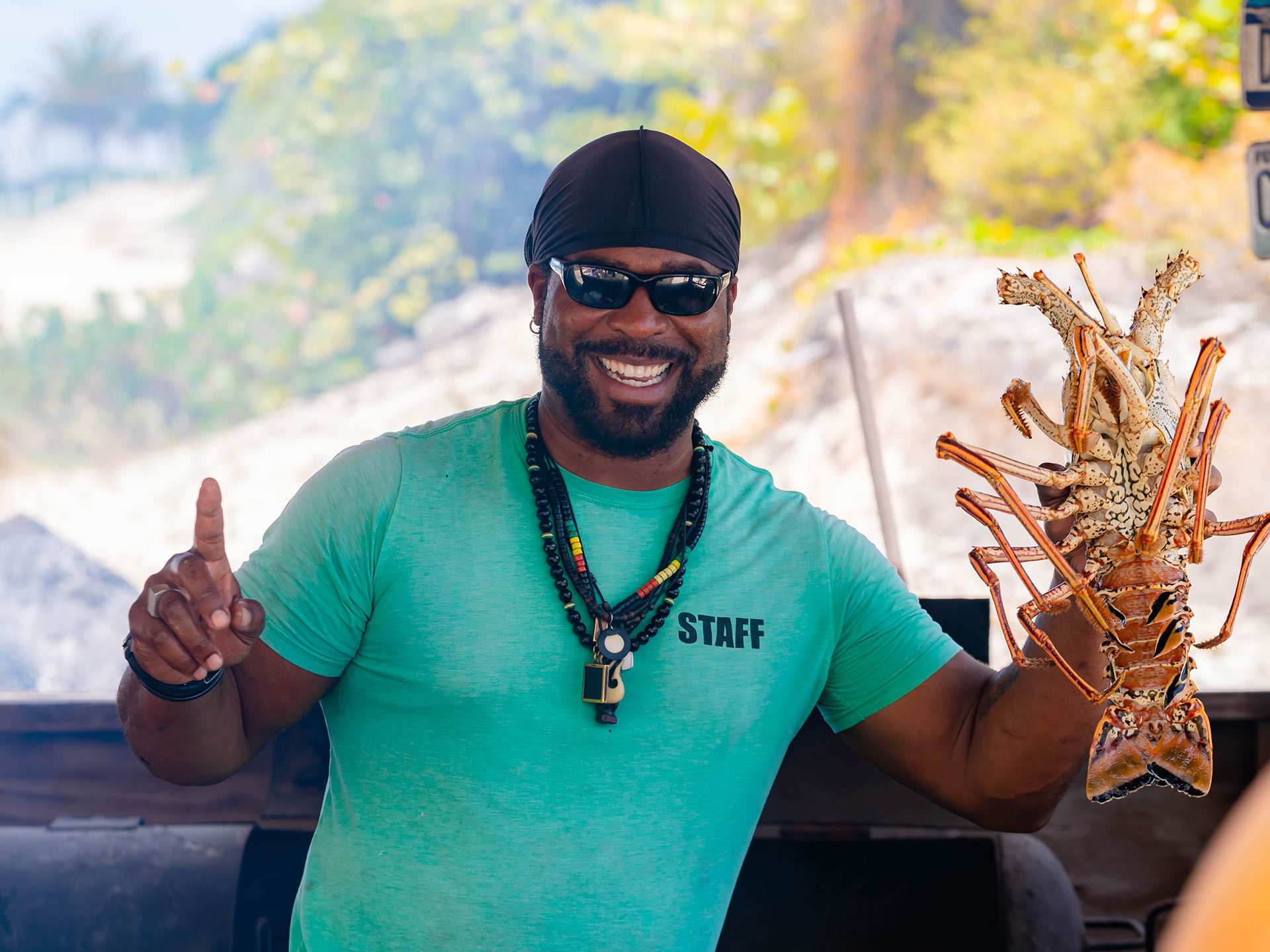 The best things to do in Anguilla | Local chef Garvey with cray fish at the Sunshine Shack