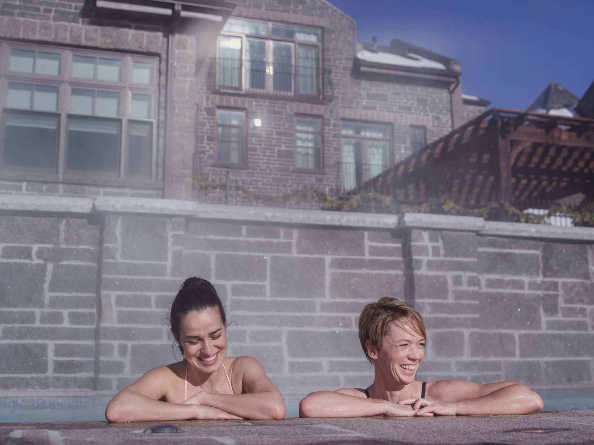Ontario wellness retreats | Two women in a therapeutic pool at St. Anne's Spa