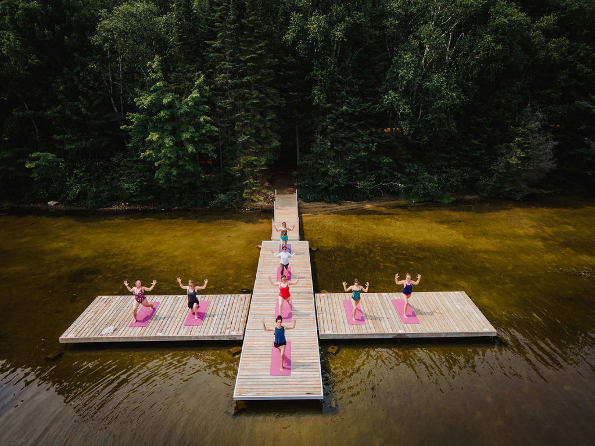Ontario wellness retreats | People doing yoga at Northern Edge Algonquin Ontario wellness retreat