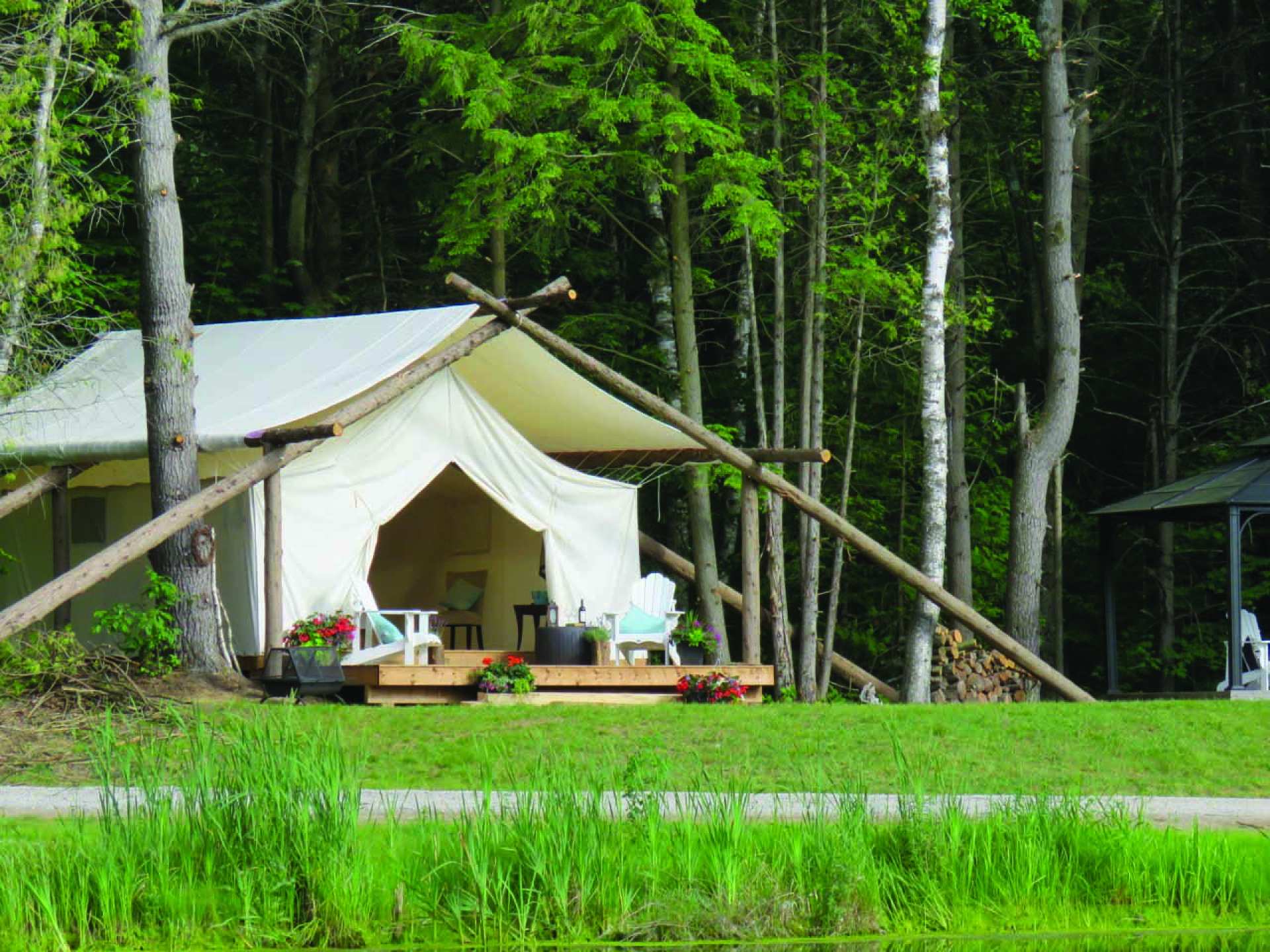 Ontario wellness retreats | A tent in the forest at Whispering Springs Ontario wellness retreat