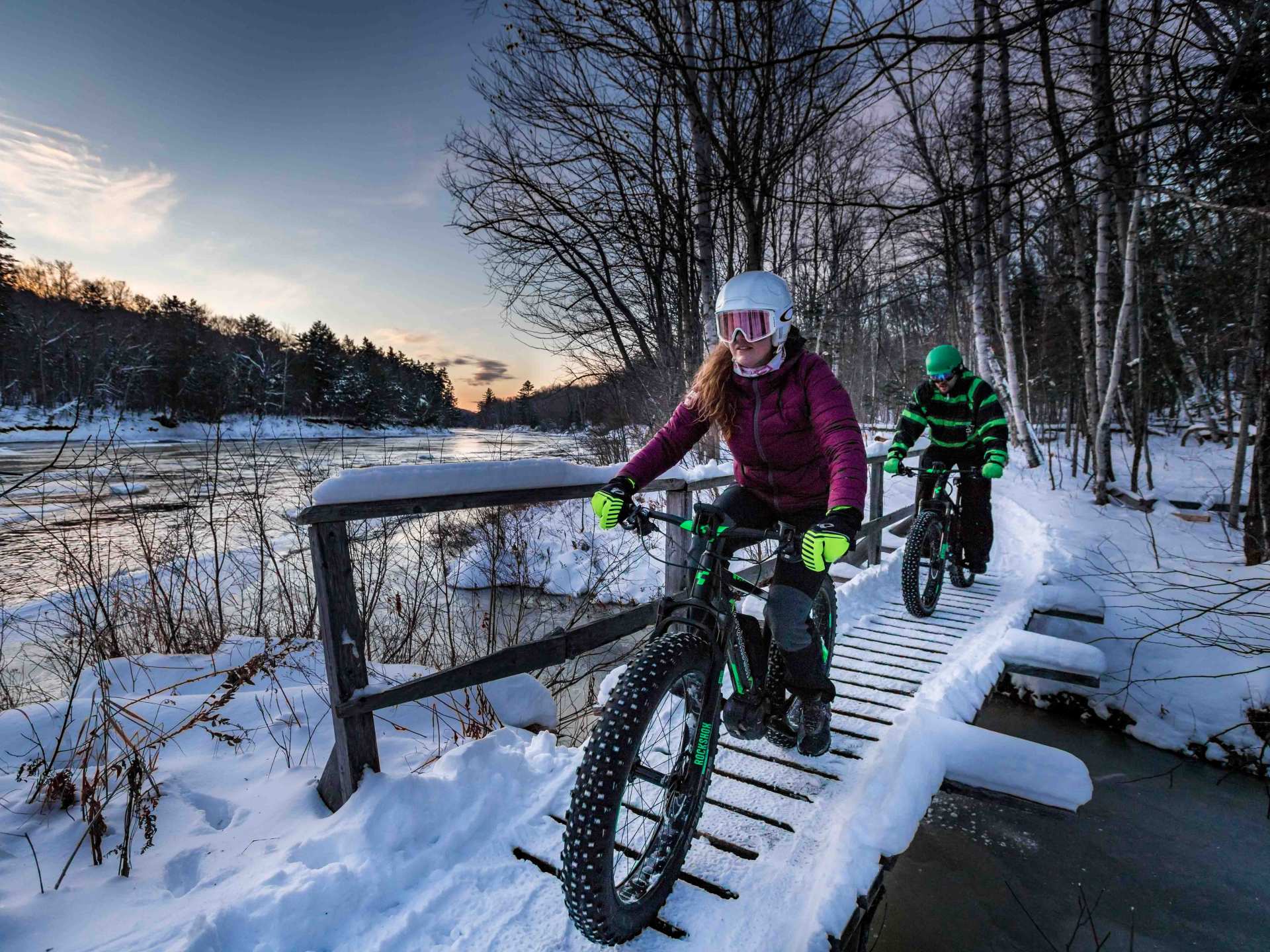 Mont Tremblant activities | Two people fat-biking through the forest with D-Tour