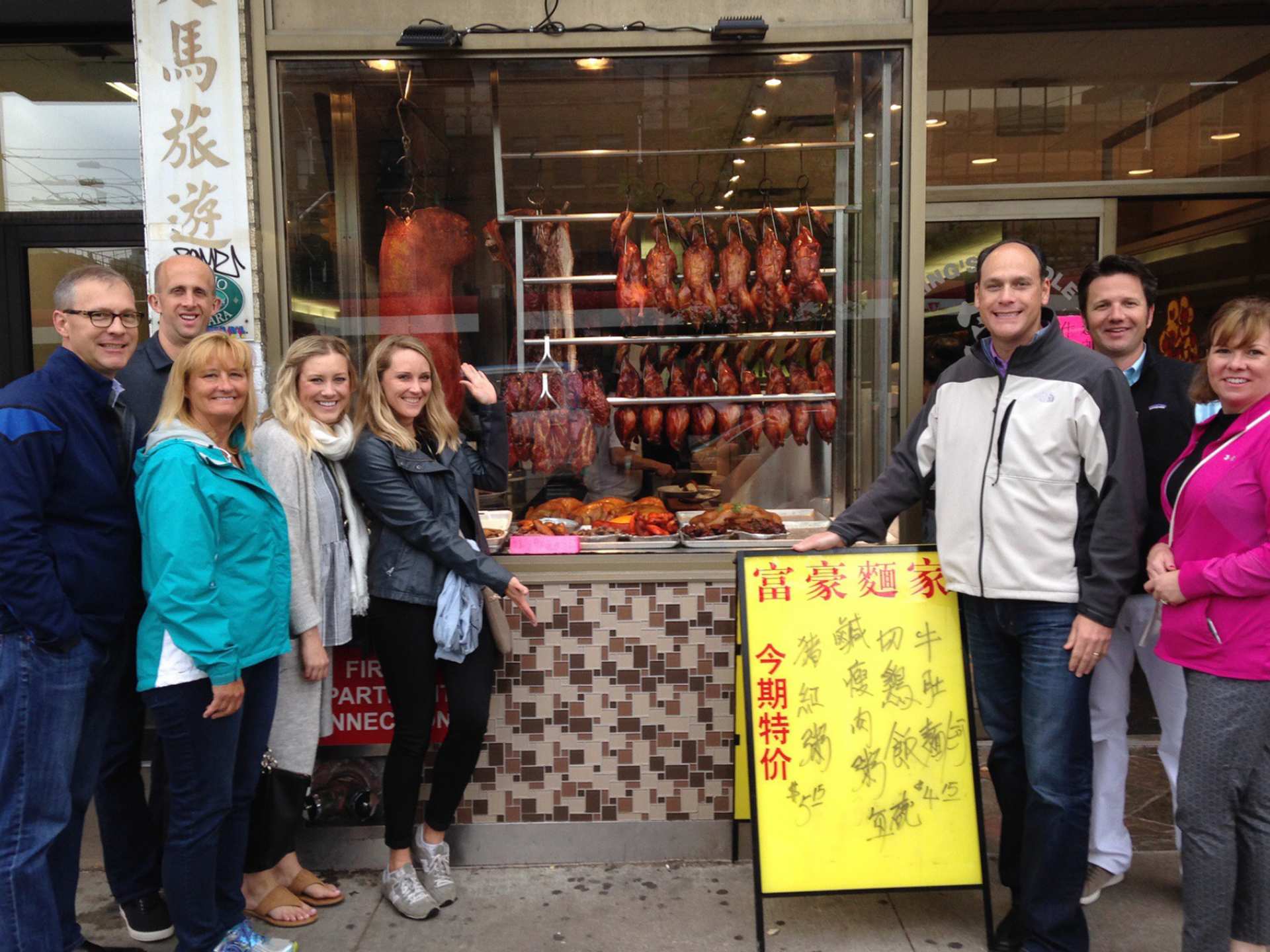 A group of Culinary Adventure Co. tour members standing outside of King's Noodle