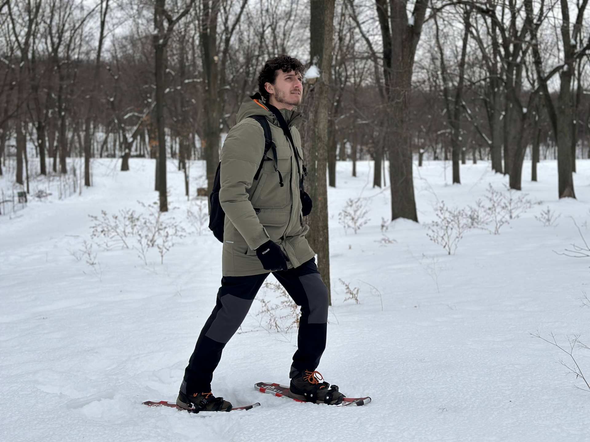 Escapism's Hunter Gutman walking through the Montréal forest wearing Columbia's Landroamer Collection