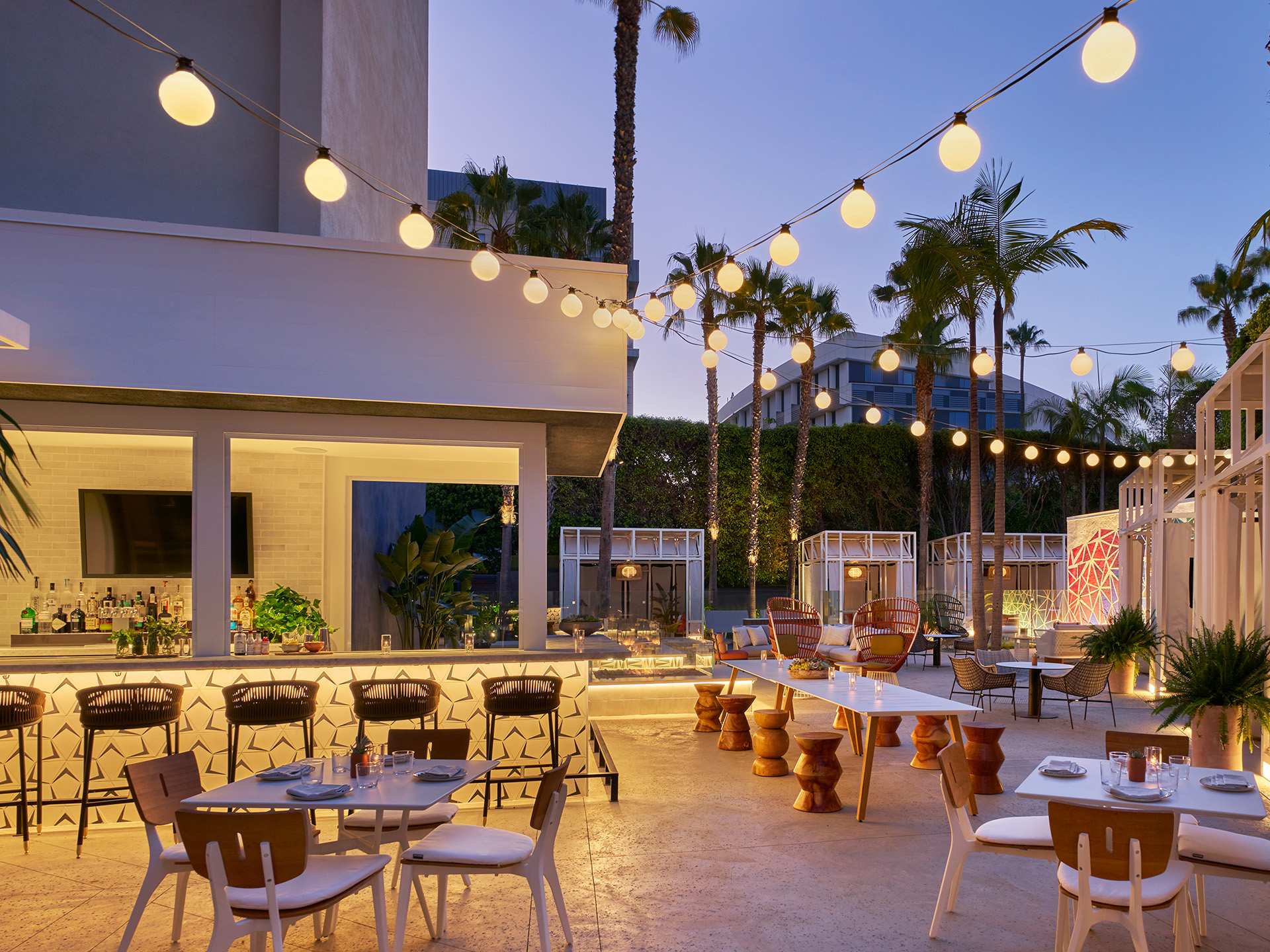 The cute patio, in the evening at Sugar Palm at the Viceroy Santa Monica