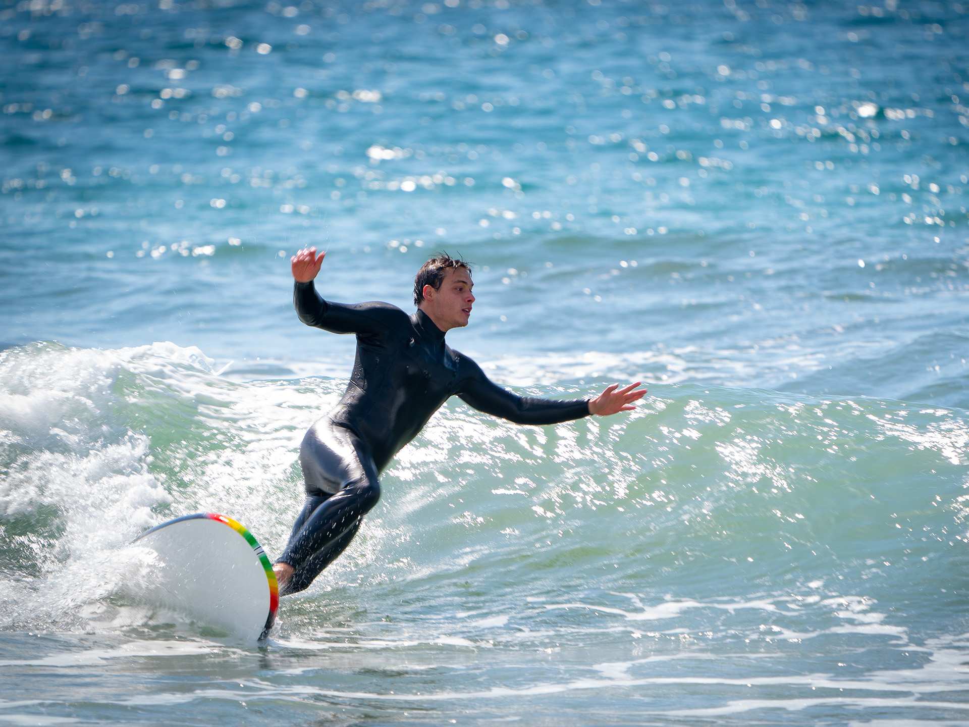 A person surfing at Santa Monica beach