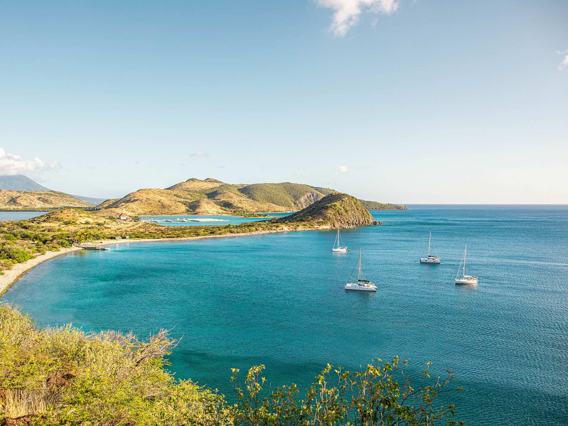 The sparkling harbour, dotted with sailboats, in St. Kitts