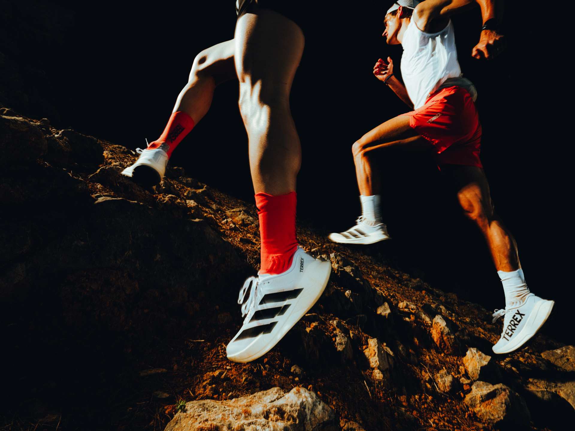 People running in the Adidas Terrex Agravic SL Trail Running Shoe