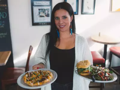 Manitoba restaurants | A server brings out dinner at Feast