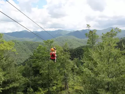 North Carolina | A woman zipling at Nantahala Outdoor Center in Bryson City, North Carolina