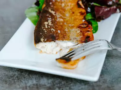 The Henderson hotel | A fork digging in to trout at The Henderson hotel