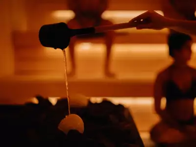 Alter cold plunge and sauna in Toronto | A snowball on the hot rocks in the sauna at Alter