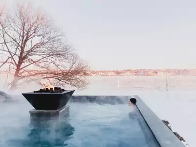 Strom Nordic Spa, Québec | A person sitting in a thermal bath at Strøm Nordic Spa — Old Québec