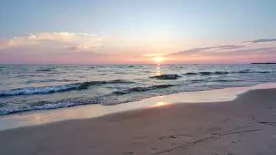 Breathtaking Ontario beaches | A sunset over Sauble Beach on Lake Huron